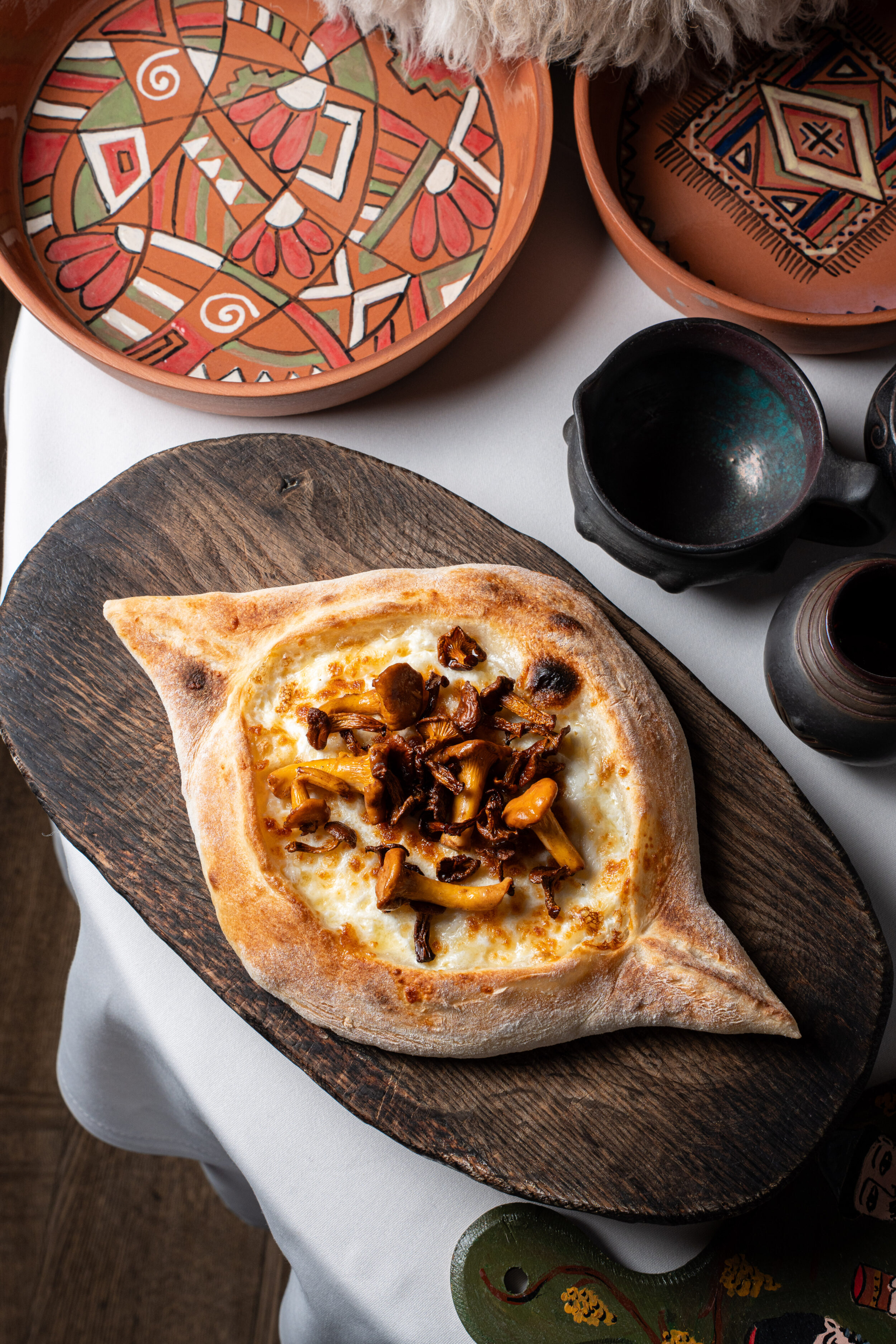 Хинкали, хачапури и лисички: сезонное меню ресторана «Шота»